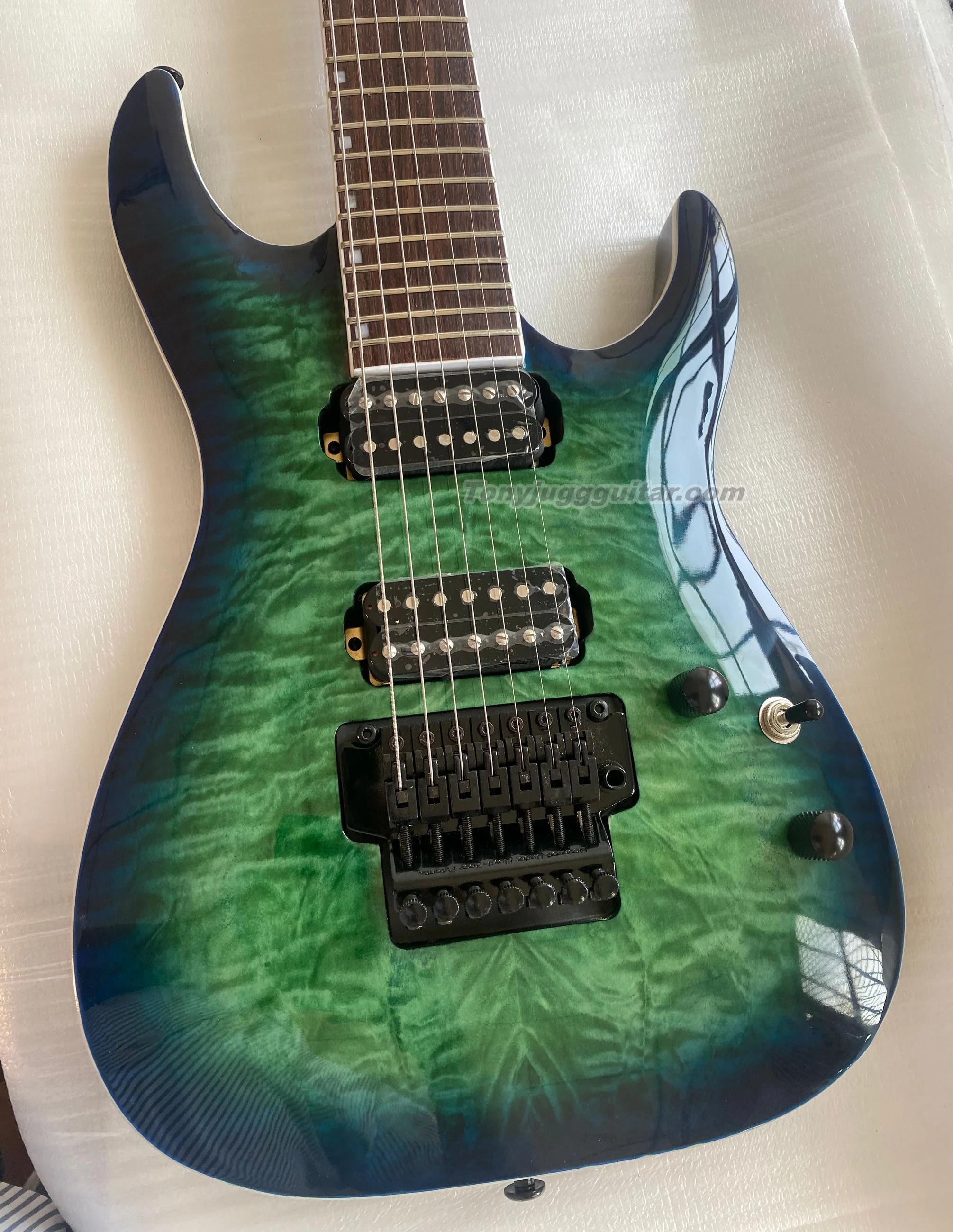 

Custom EII7 String Black Turquoise Burst Quilted maple top Electric Guitar ，Floyd Rose tremolo，mahogany body &maple neck