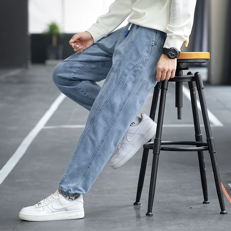 

Plus Size Mens Regular Fit Elastic Waist Tapered JeansPrinting Words Drawstring Loose Legs Pants