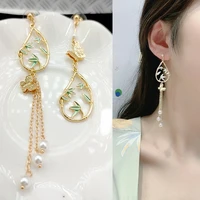 2022 new elegant butterfly imitation pearl dangle earrings for women flower leaves cute cat asymmetrical tassel earring jewelry