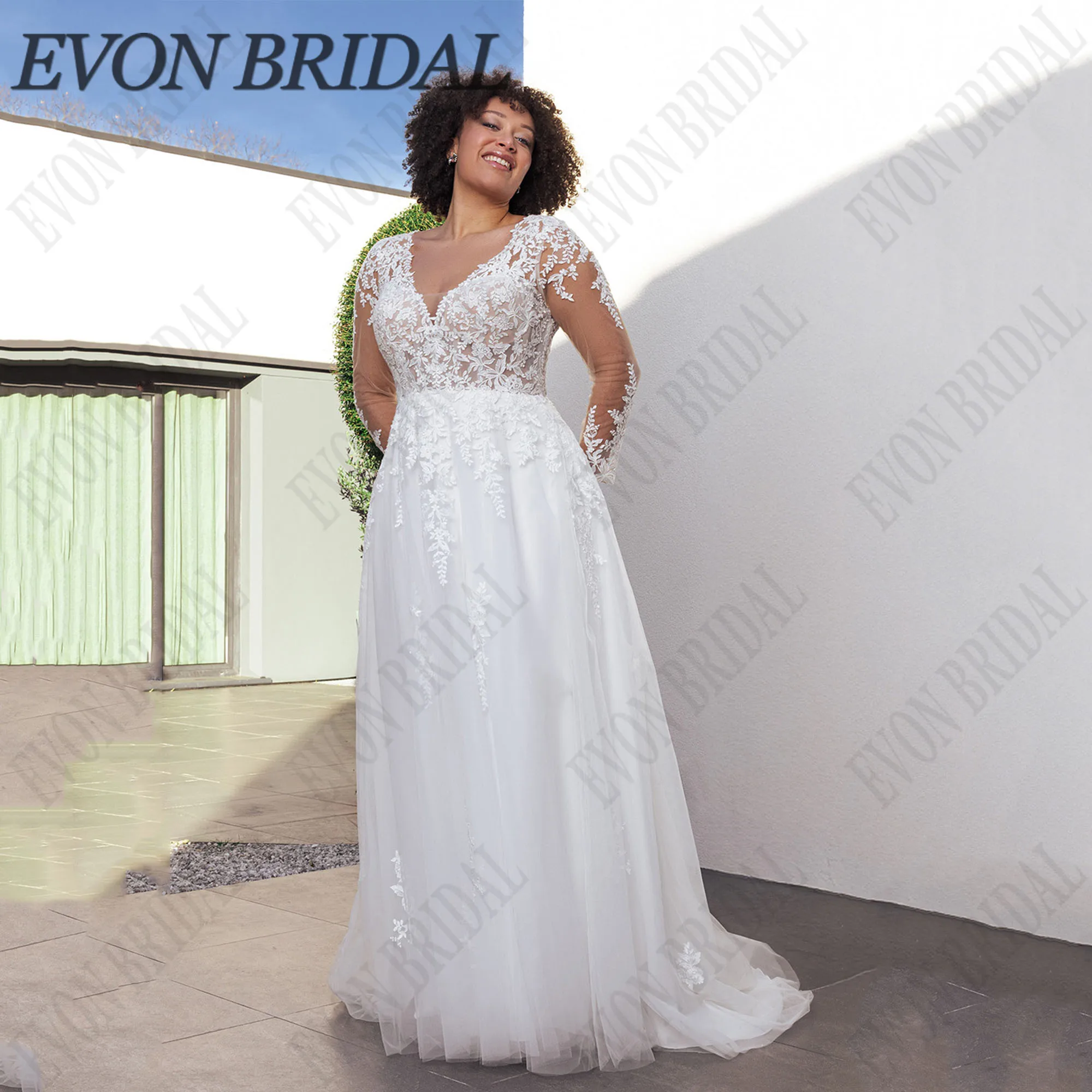 Фото EVON BRIDAL Свадебное платье больших размеров трапециевидной формы с длинными рукавами и v-образным вырезом Vestidos De Novia Элегантное платье невесты с аппликацией на шнуровке на заказ №1