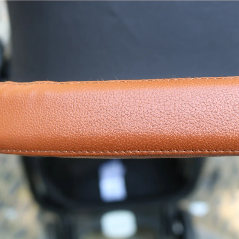 Фото Чехол для ручки детской коляски Bugaboo Butterfly Push Bar Pu защитный чехол для ручки кресла №4