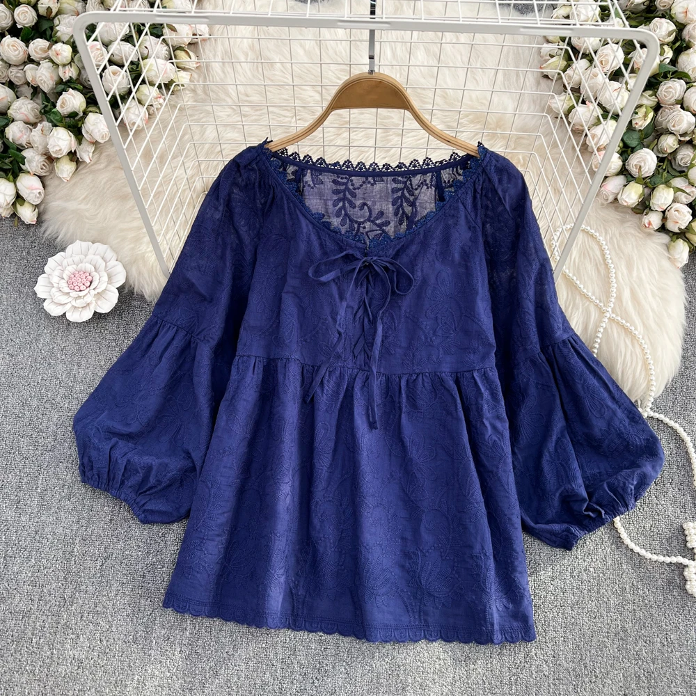 

Clothland Women Chic Bow Tie Lace Blouse Lantern Sleeve V Neck Embroidery Shirt White Blue Casual Sweet Tops Blusa LA642