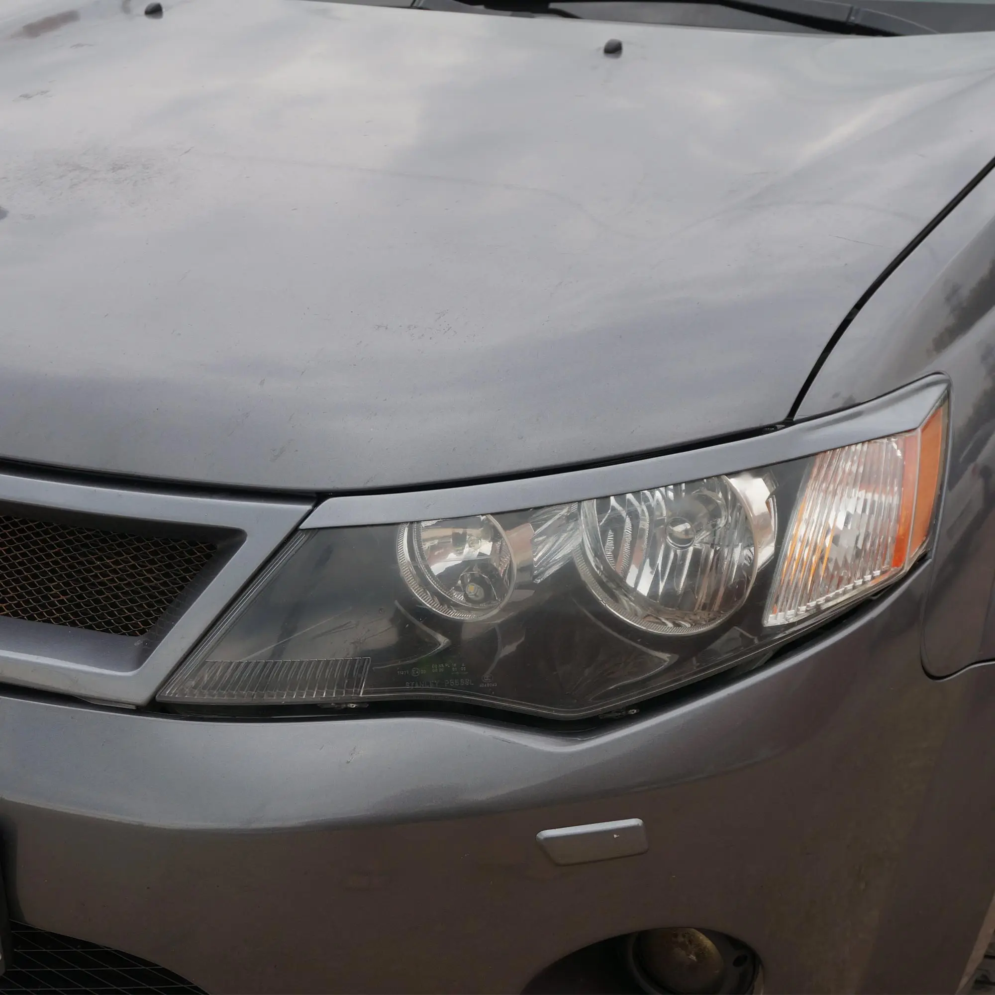 Накладки на переднюю оптику для Mitsubishi Outlander XL (2005-2009) АБС пластик ресницы фар