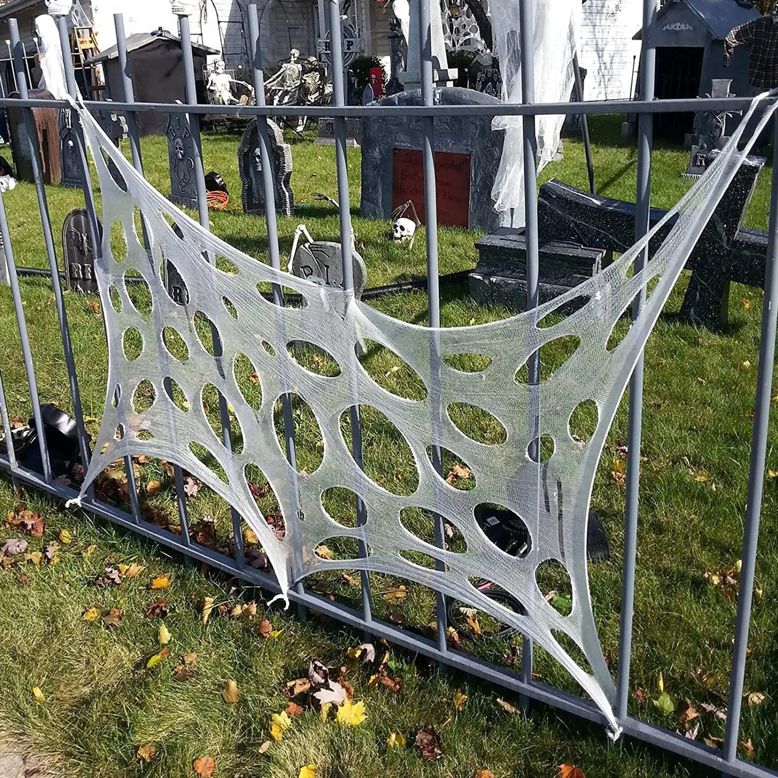 Жуткая паутина для Хэллоуина 100*410 см с 10 молотыми палочками