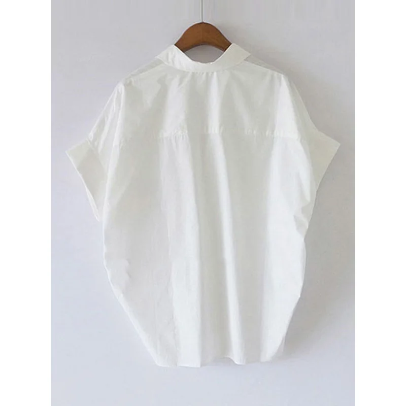 Женская блузка с рукавами летучая мышь и воротником лацканами