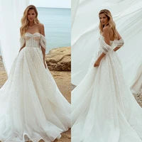 sparkly boho wedding dresses 2022 bohemian sequined beaded wedding gowns off the shoulder beach sweep train bridal dress