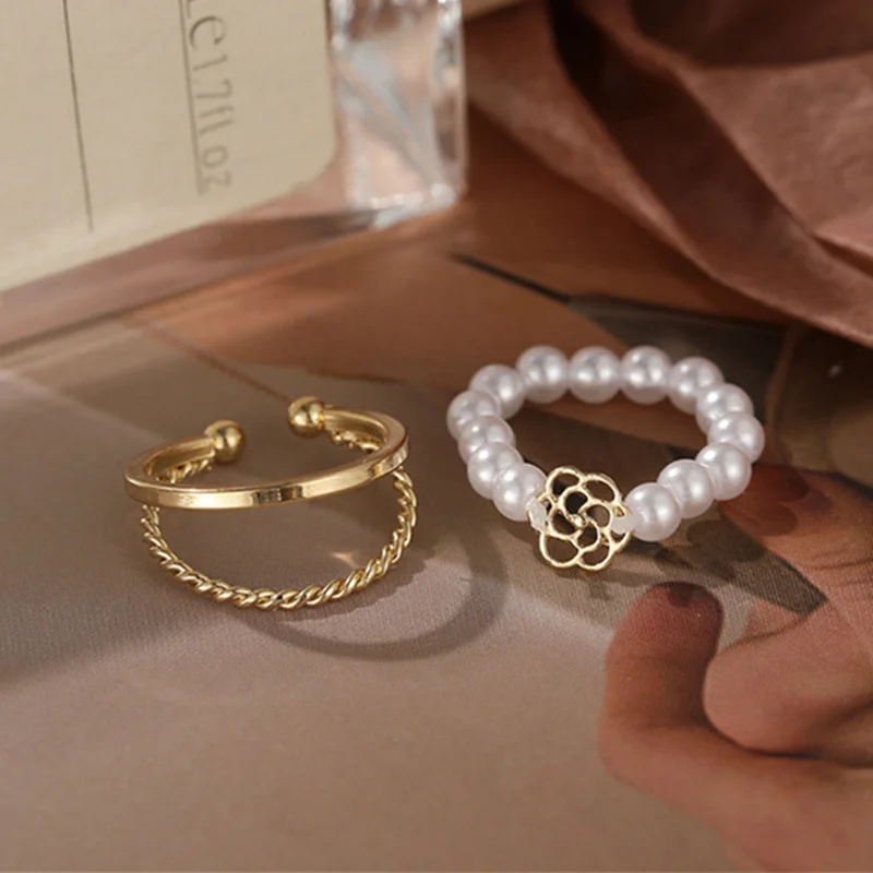 

Fashion Romance Camellia Pearl Elastic Female Ring Simple Sweet Hollow Joint Index Finger Adjustable Ring 2Pcs Jewelry Set