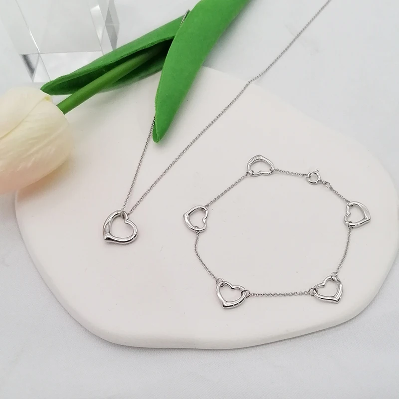 

Luxury Boutique Silver Heart Hollow Bracelet Simple Necklace 925 Sterling Silver Fashion Classic Holiday Gifts Free Shipping
