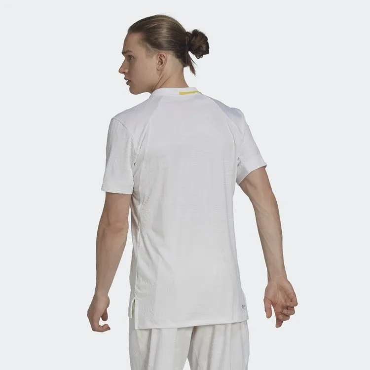 Рисунок 2 - Мужская белая футболка-поло Adidas