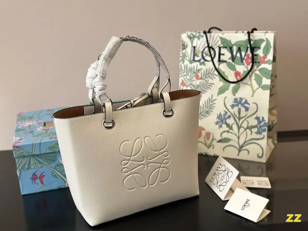 в стиле Loewe Вместительная женская сумка на ножках с плетеной ручкой через плечо 27