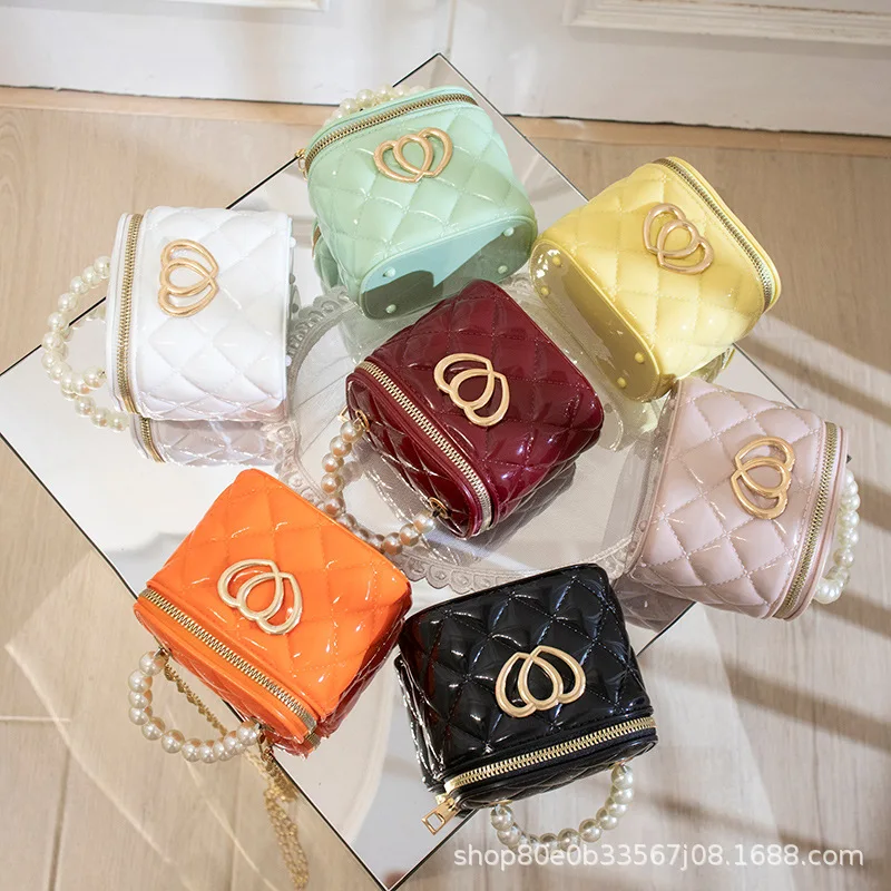 

Wholesale Solid Color Ladies Pearl Handbags 2022 Women's PVC Jelly Party Bucket Bag