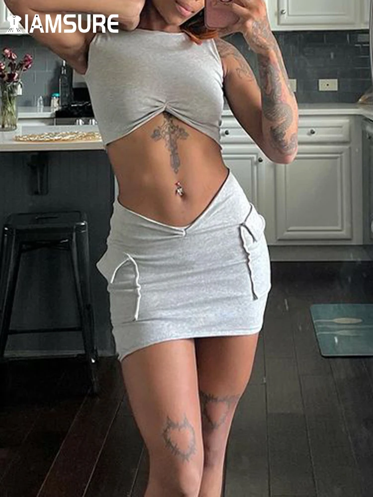 

IAMSURE Sexy Solid Pockets Dress Set Women 2022 Holiday Slim Basic 2 Piece Sets O-Neck Sleeve Crop Tops Mini Skirts Streetwear
