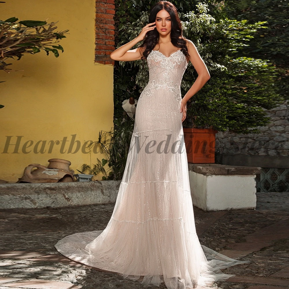 

Sexy 2023 Spaghetti Straps Wedding Dress Mermaid Sweetheart Backless Court Train Applique Sequins Beads for Ladies Bridal Gowns
