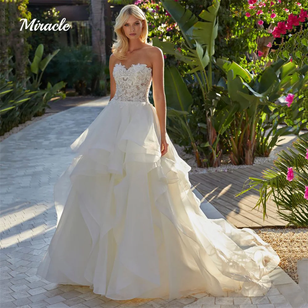 

Gorgeous Sweetheart Wedding Dress Bridal Gown Tiered Intriguing Sleeveless A-Line Comely Backless Lace Applique Vestido De Novia