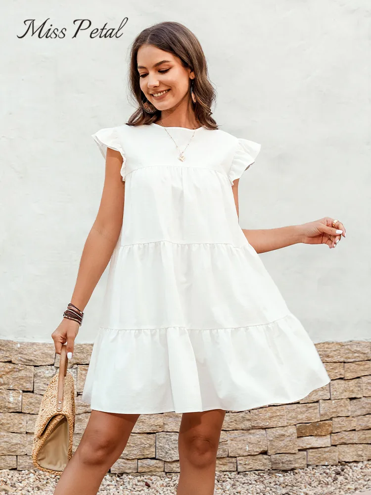 

Женское мини-платье с круглым вырезом и рукавом-крылышком