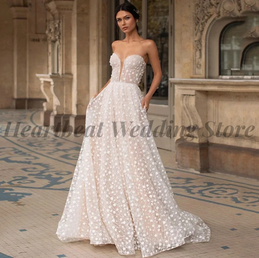 

A-Line Wedding Dress for Women with Morden Court Train Backless and Strapless Bridal Gowns Chiffon Applique Robe De Mariee