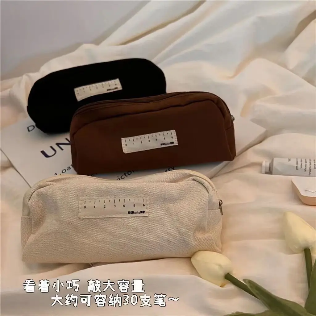 

Simple ins Japanese black and white high-looking pencil case large capacity student canvas stationery box portable makeup storag