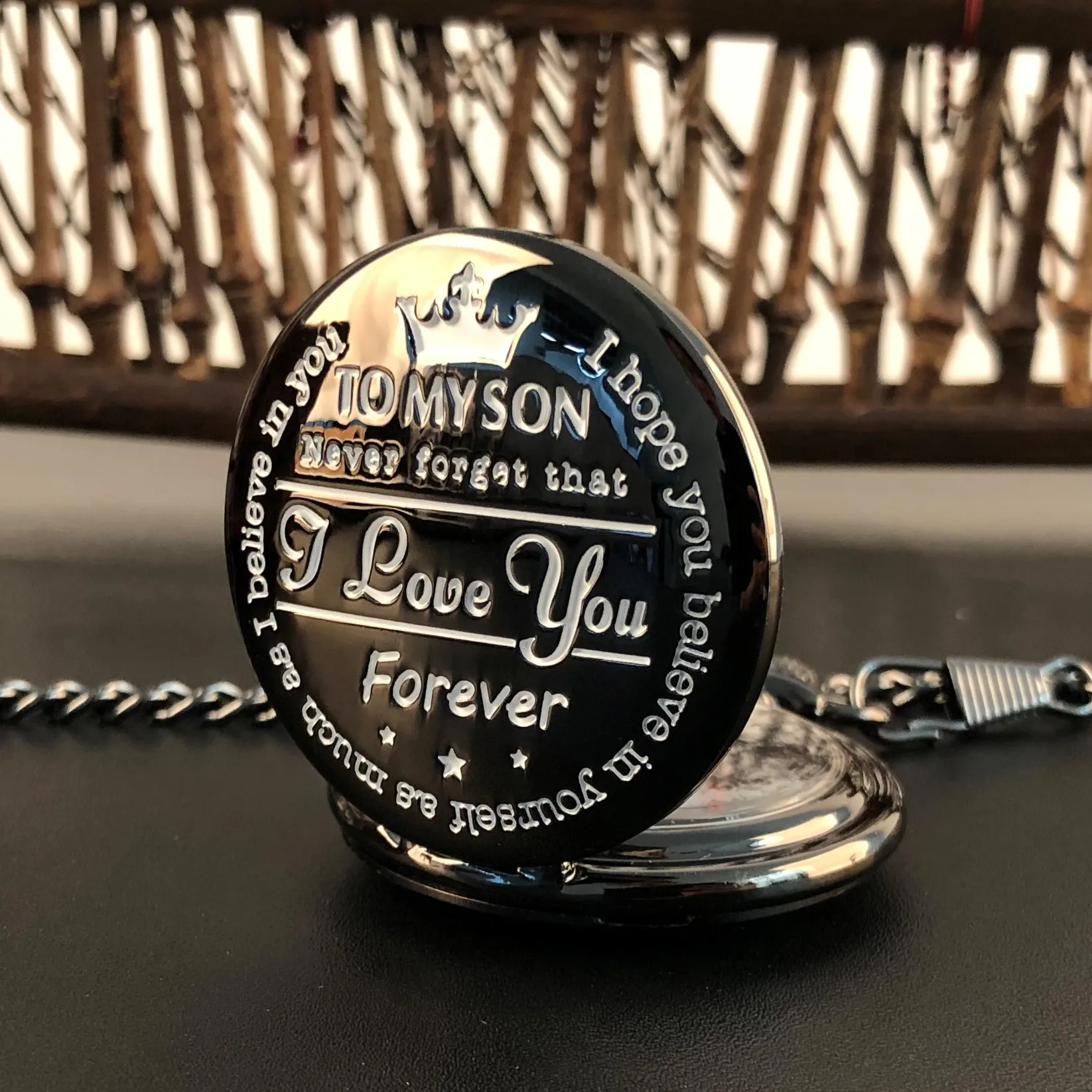 Рисунок 3 - Черные карманные часы с гравировкой «моему сыну»