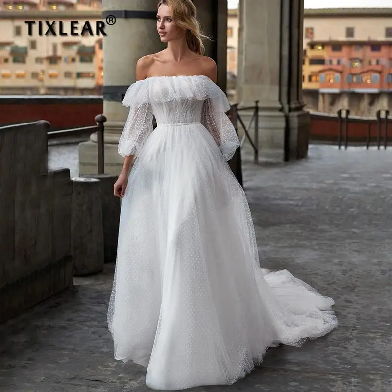 

TIXLEAR Puffy Tulle Bohemian Beach Wedding Dress Bride 2022 Elegant Puff Sleeve A-Line Off The Shoulder Bridal Gown Backless