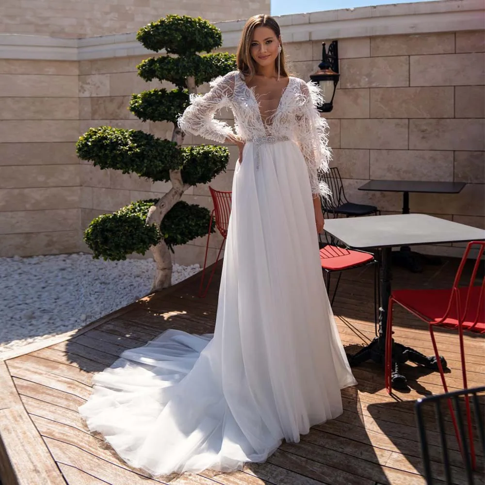 

Exquisite Bridal Gowns 2022 Sexy Deep V-Neck Backless Wedding Dress Lace Sequins Feathers Long Sleeve Tulle Bride Dress Custom