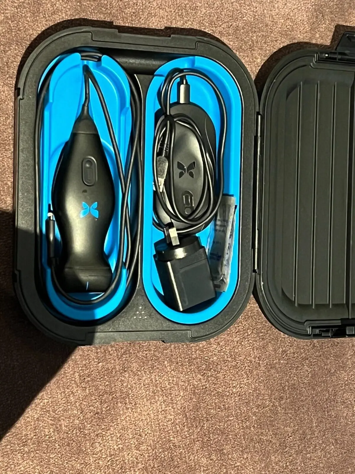 

T B Butterfly IQ Handheld ultrasound