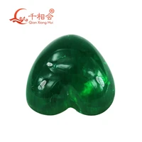 heart shape flat back cabochon grown hydrothermal emerald green color including minor cracks inclusions loose gem stone