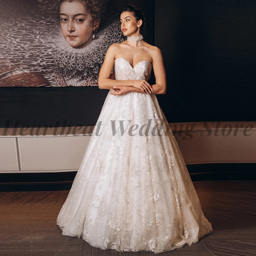 

Exquisite A-Line Wedding Dress for Brides with Sleeveless Sweetheart Lace-Up Backless Court Train and Applique Sequins Beads