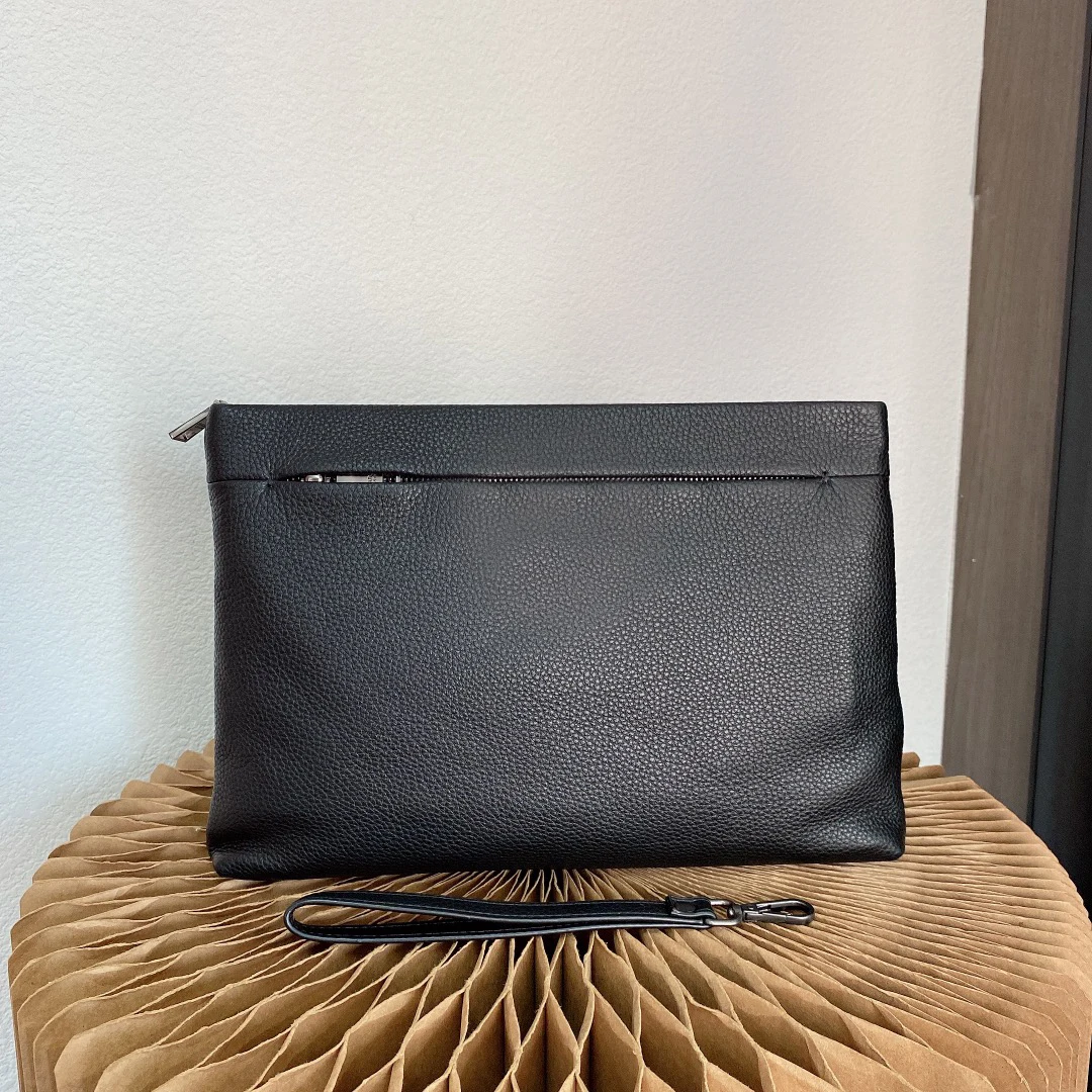 

New Men and Women Fashion Casual High quality genuine cowhide Black Wrist Bag Luxury Designer Clutch Toiletry Bag Wallet