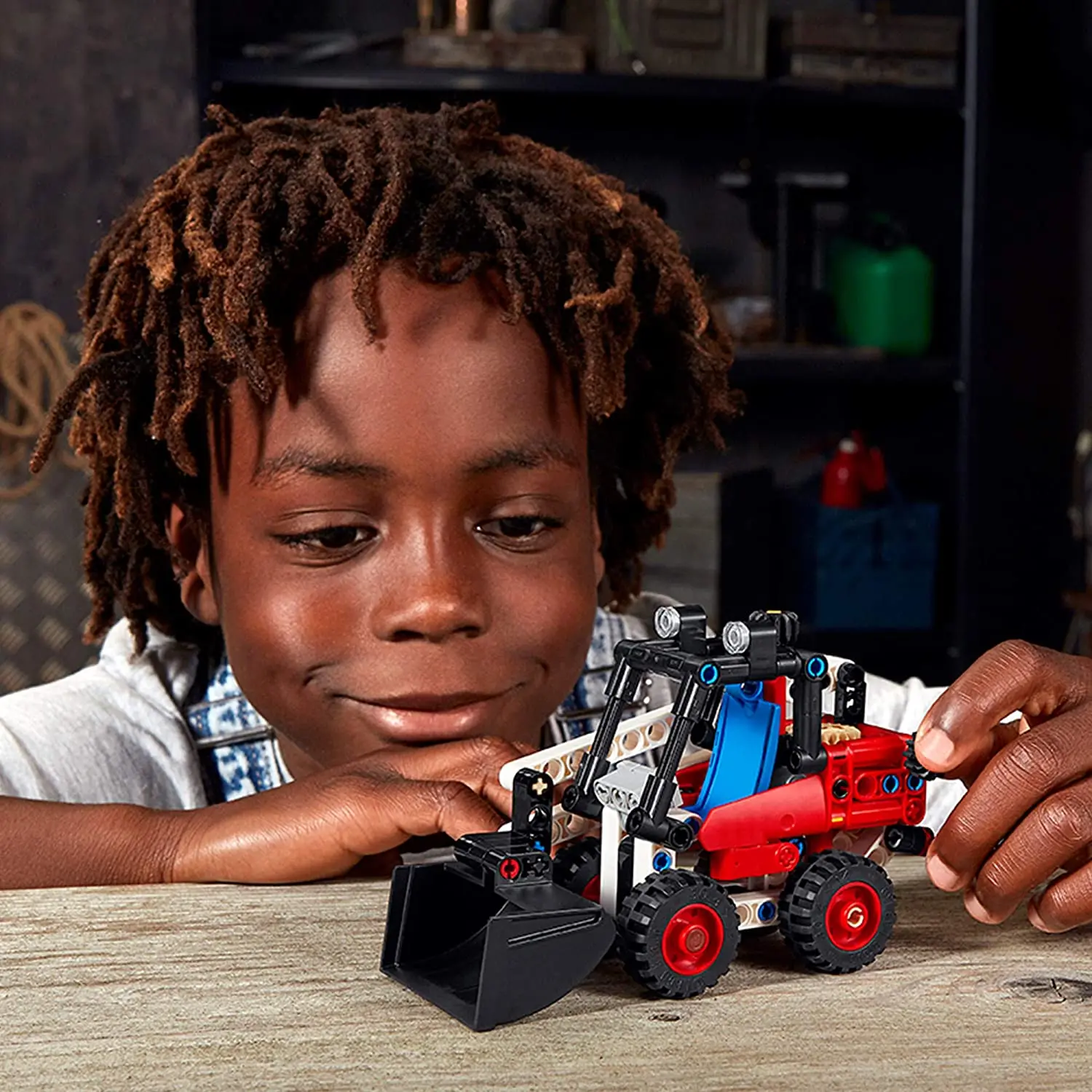 Погрузчик с бортовым поворотом LEGO Technic 42116 набор для строительства моделей детей