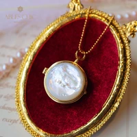sterling silver mother of pearl locket pendant gold tone double sided white shell storage necklace l1s2n31008