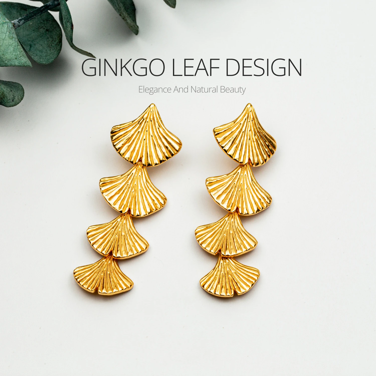 Золотые серьги-капельки гинкго