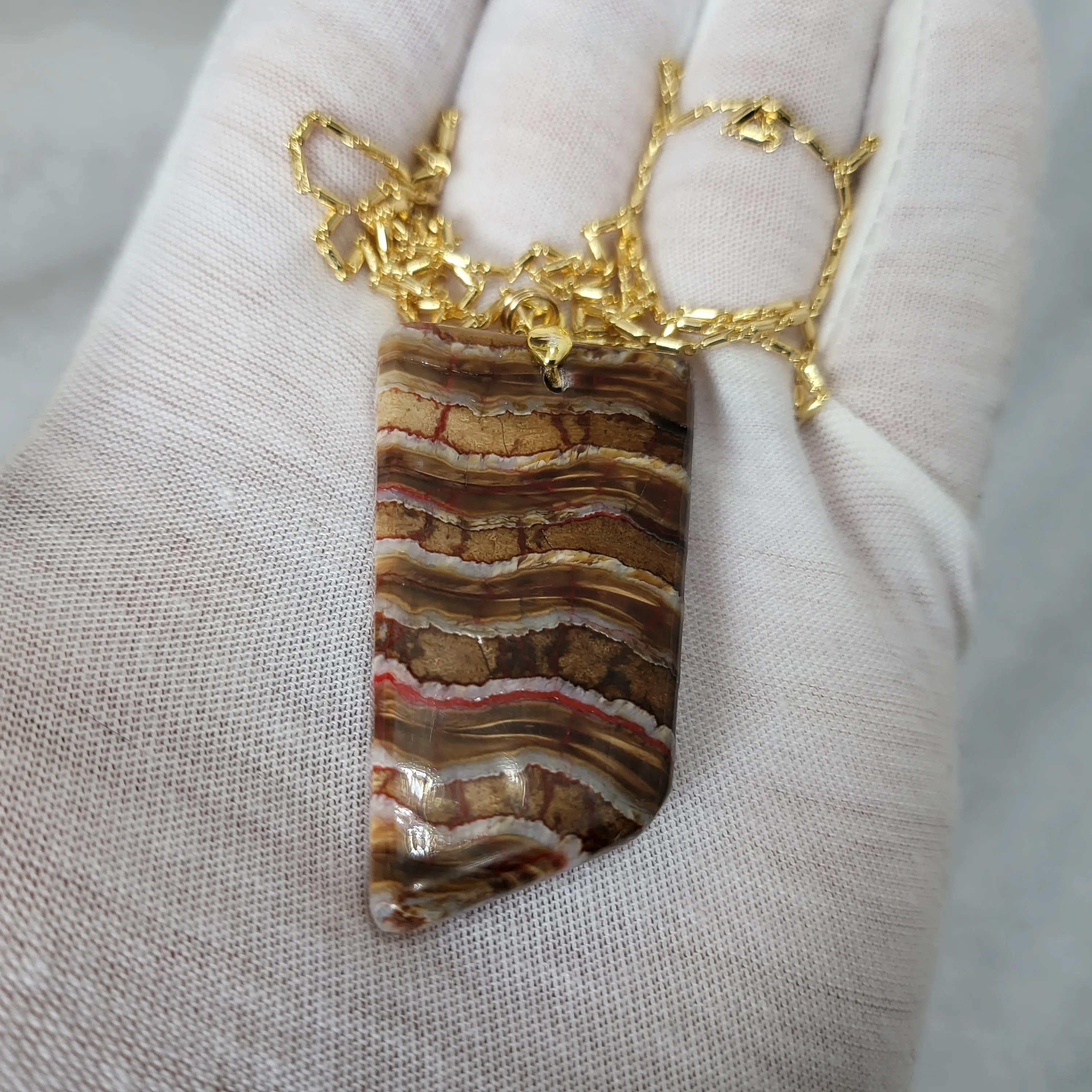 Рисунок 4 - Кулон, подвеска из стабилизированного зуба мамонта