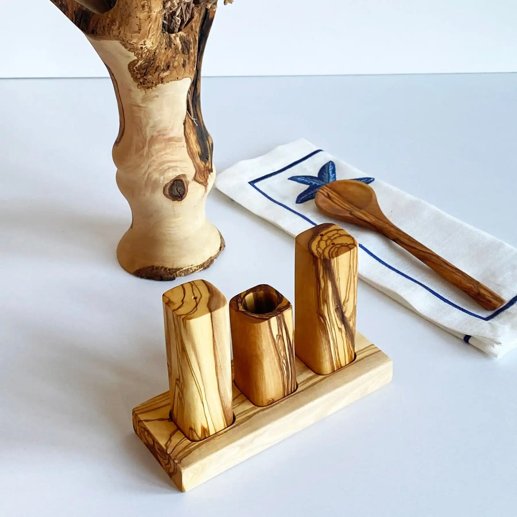 

Olive Wood Salt & Pepper Shaker Set with Toothpick Holder and Stand - Stylish Kitchen Ensemble for Culinary Excellence"