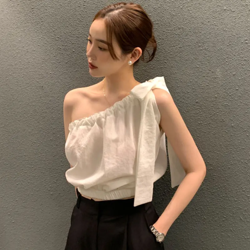 

Clothland Women Sexy Skew Collar Blouse Bow Tie Sleeveless White Black Crop Top Short Style Sexy Shirt Tops Mujer WA125