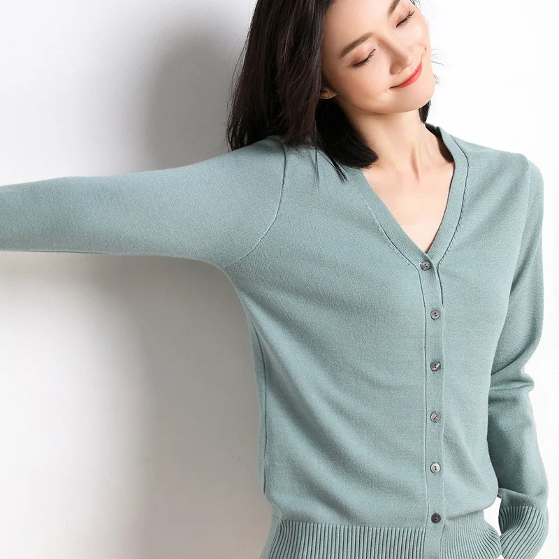 

2020 new women's early autumn V-neck cardigan white sweater knitted sweater with button cardigan solid color jacket