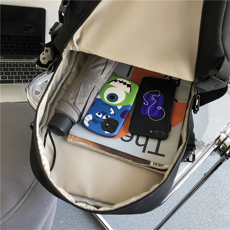 

DIFA New Waterproof Nylon Women Backpack Men Multiple Pockets Travel Bag College Couples Schoolbag Solid Color Laptop Backpack