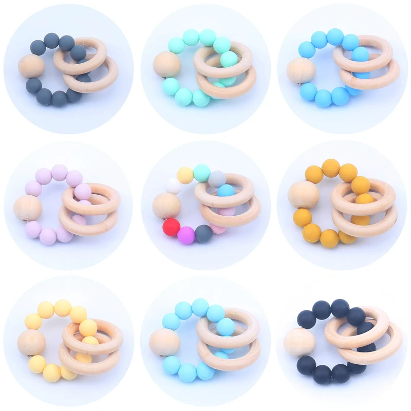 

Hot Baby Woode Teether Rings Food Grade Beech Chews Pacifier Clip Holder Silicone Beads Pacifier Chains Teether Toys for Newborn