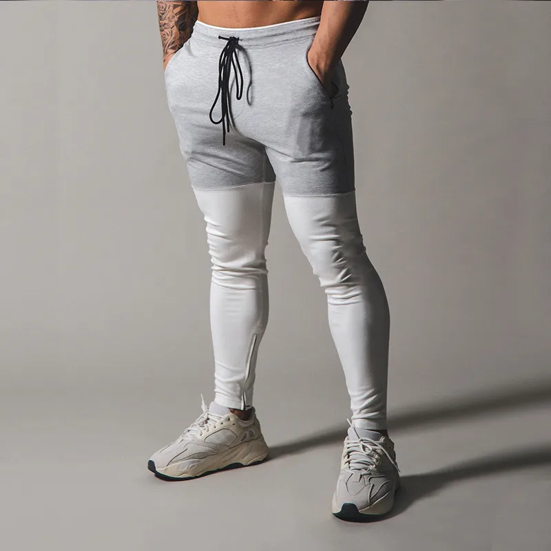 

Men Sports trousers and pantupper black and lower gray Patchwork Pants Men Slim Tracksuits Autumn Long Pants