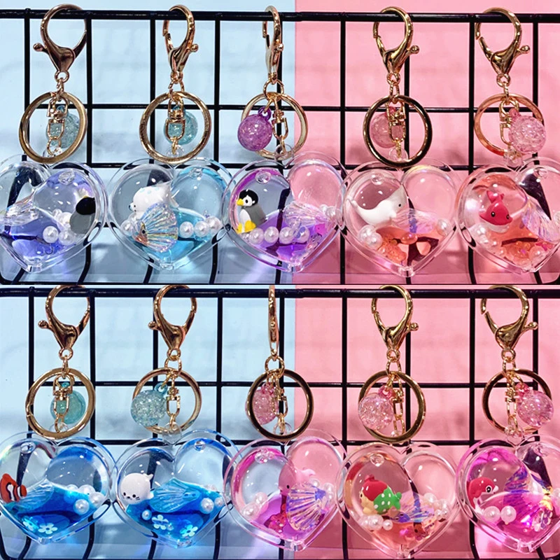 В форме сердца с блестками принтом зыбучих песков брелок жидкость плавающий