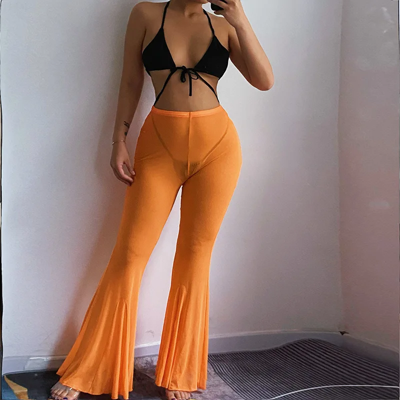 

Women Mesh Flare Pants Stretchy Mid Waist See Through Party Club Beach Skinny Trousers Female Summer Streetwear 2021 Yuqung