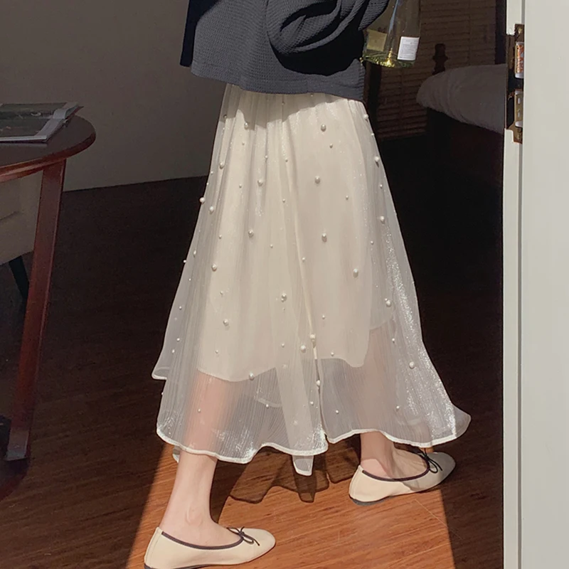 

Traf design sense of bright silk beaded temperament elegant slim skirt 2022 spring and summer new joker solid color A-line skirt