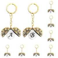 1pc metal keychain a z alphabet double layer can be opened fashion suspension bag pendant