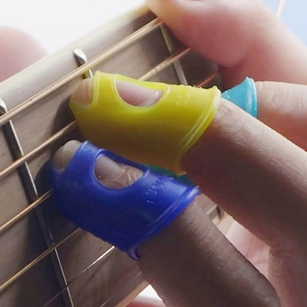 

4pcs Guitar Playing Left Hand Fingertip Protector Ukulele Guitar Fingertip Silicone Protective Cover
