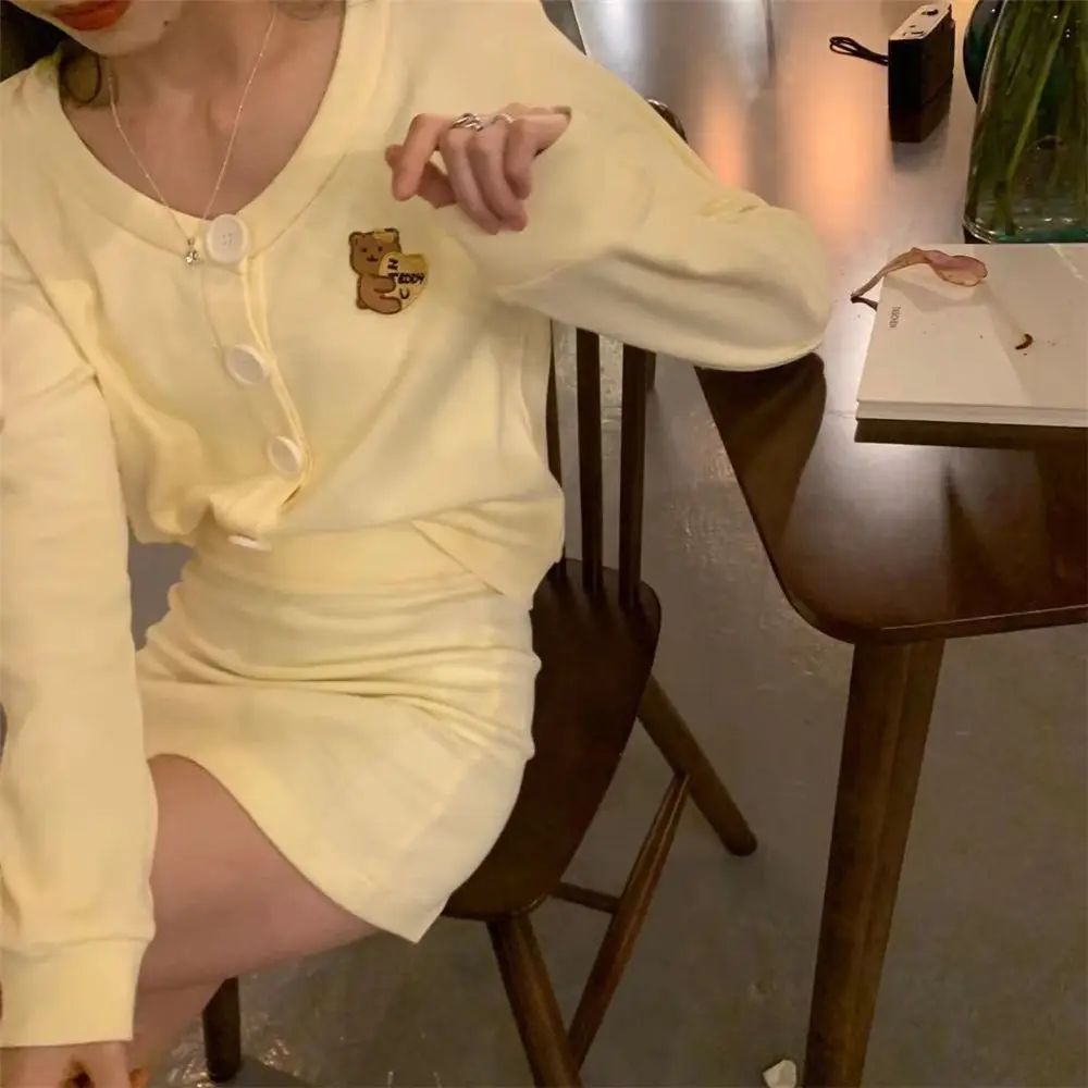

Spring and Autumn Long-Sleeved Cardigan Embroidered Bear Top Hip Skirt Fashion Two-Piece Suit Internet Celebrity Same Style