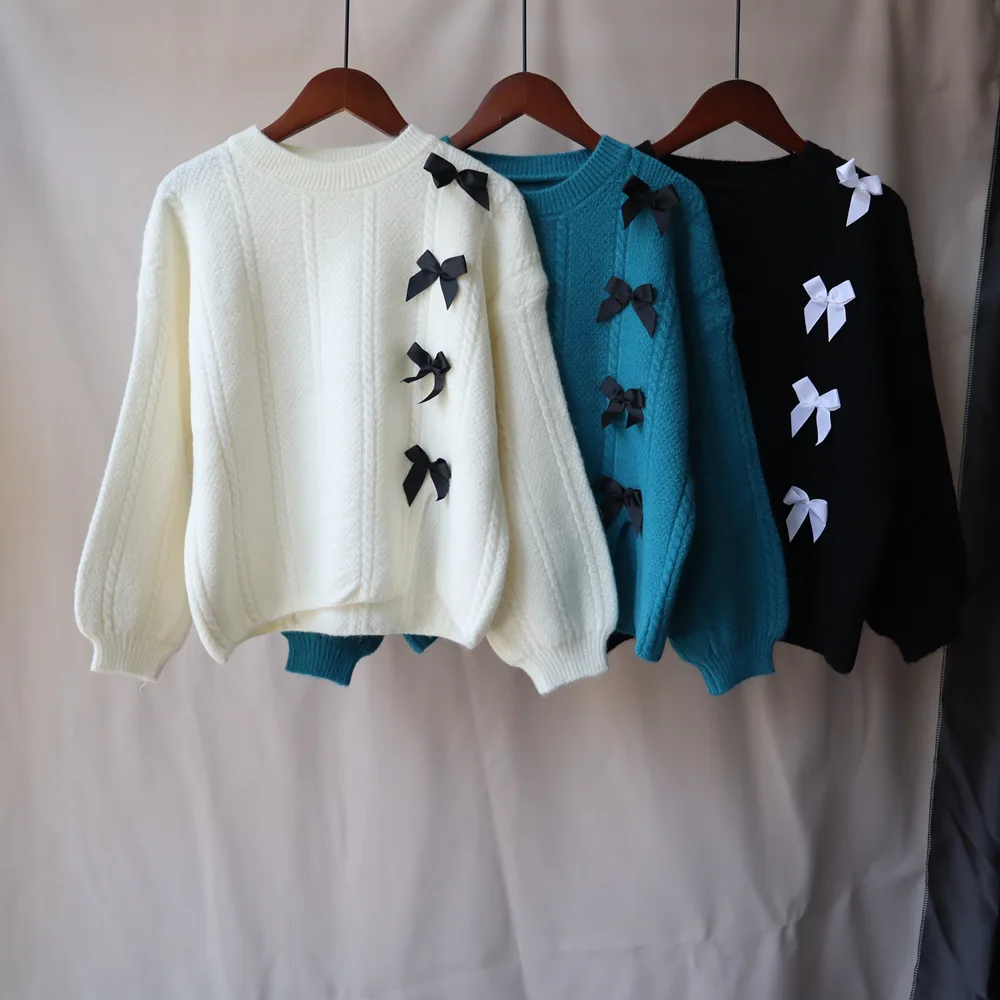 

Autumn and winter 2021 new fashion Korean Pullover Sweater women's bow open fork bubble sleeve design trendy