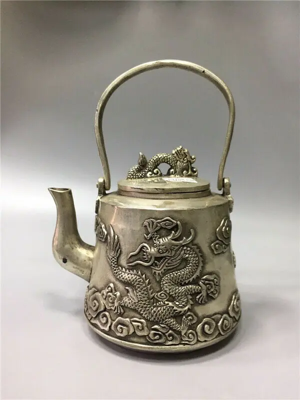 

Chinese Tibet Silver Copper Handwork Carved Dragon Teapot W Daming Xuande Mark