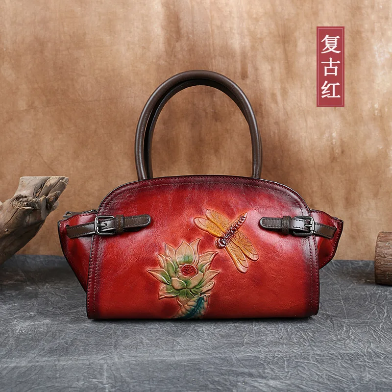 

Leather women's bag 2021 spring new flower first layer cowhide dumpling bag literature and art national style one shoulder slant