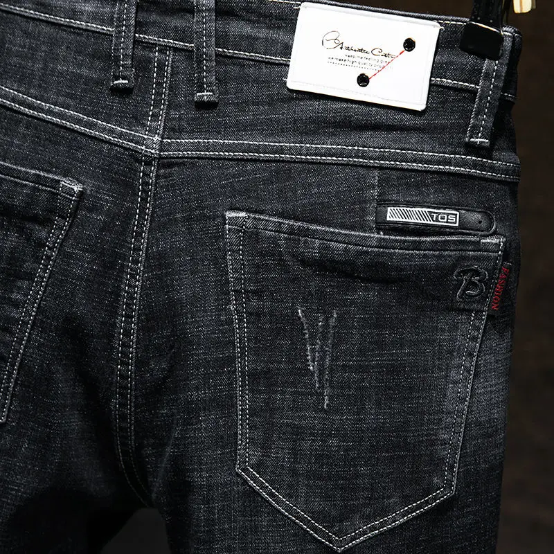 Mens jeans spring and summer four seasons jeans men's slim elastic black feet pants Korean trend casual straight trousers