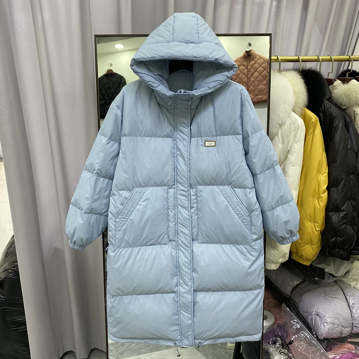 

Blue medium length down jacket for women in autumn and winter 2021