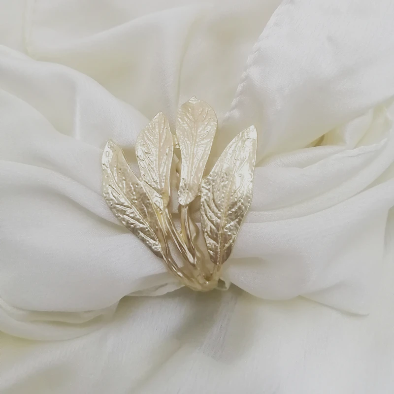 

Metal leaf napkin buckle Hawaiian wedding napkin ring napkin knot buckle corner buckle accessories manufacturers wholesale
